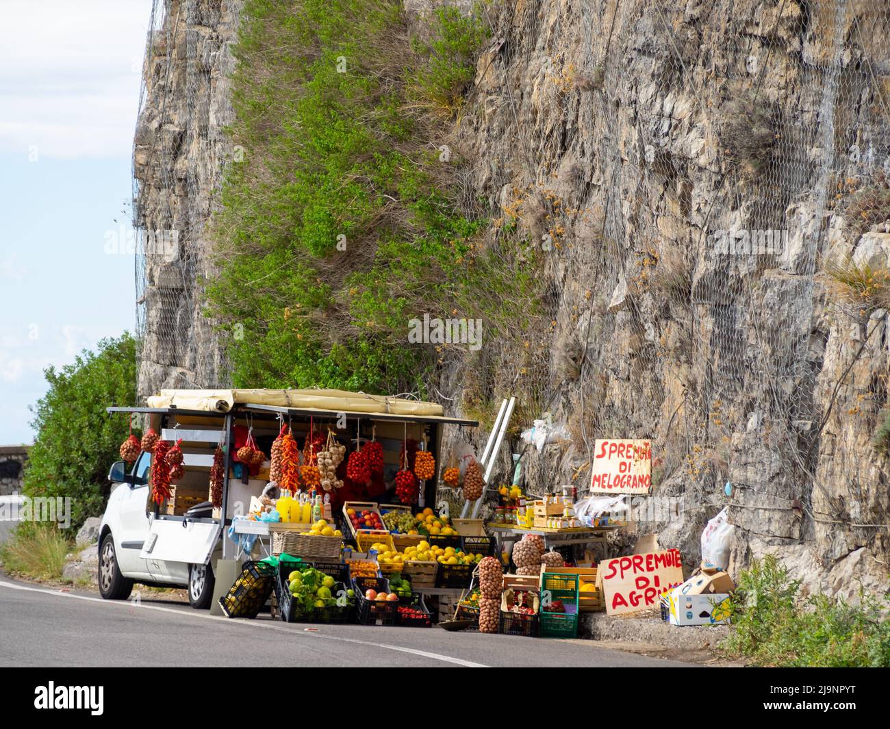 A truck selling fruits and vegetables on the roadside in Amalfi coast Stock Photo