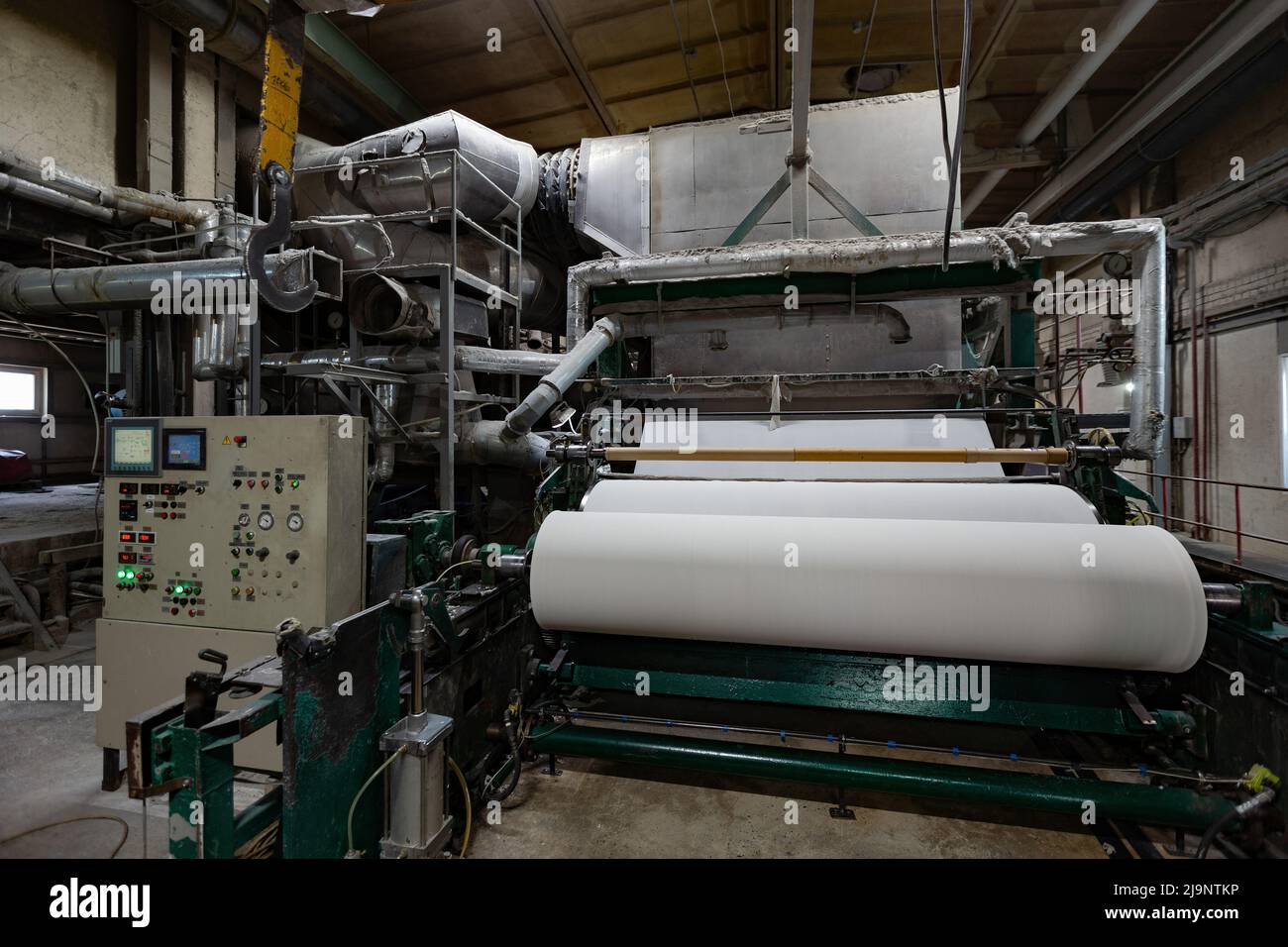 Waste paper recycling plant. Machine for production of paper rolls