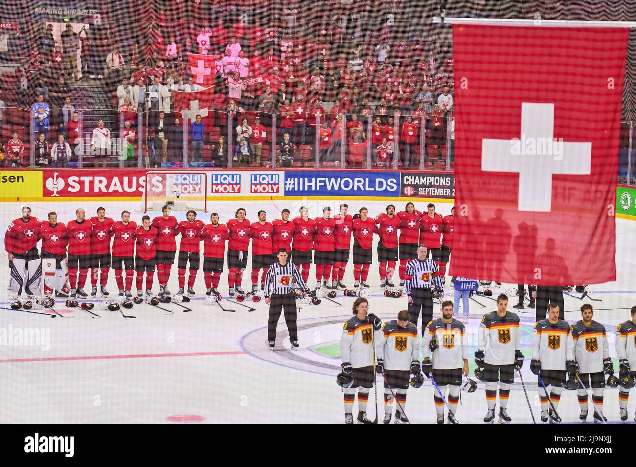 Helsinki, Finland. 24th May, 2022. Team DEB and SUI at anthem in the match GERMANY - SWITZERLAND 3-4 after penalty shootout IIHF ICE HOCKEY WORLD CHAMPIONSHIP Group A  in Helsinki, Finland, May 24, 2022,  Season 2021/2022 © Peter Schatz / Alamy Live News Stock Photo