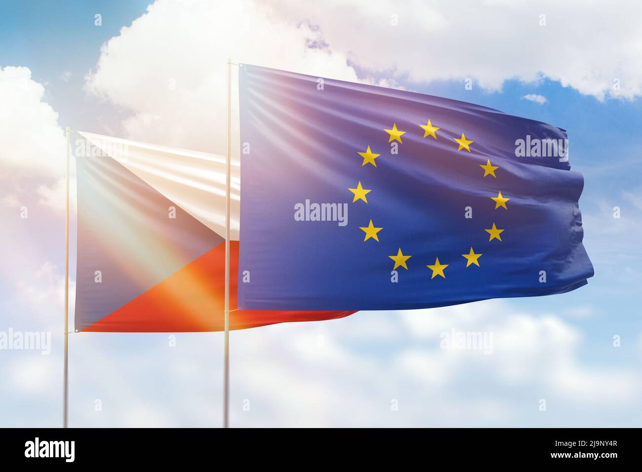 Sunny blue sky and flags of european union and czechia Stock Photo - Alamy