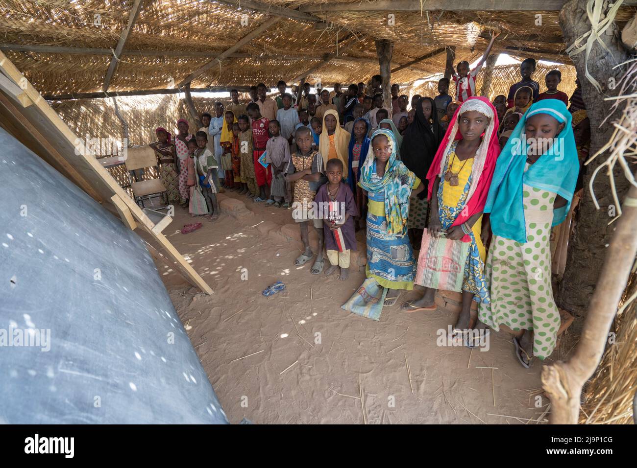 N'Djamena, Chad - March 13 2019:a school made of mats in the african desert, boys and girls in the village receive education Stock Photo