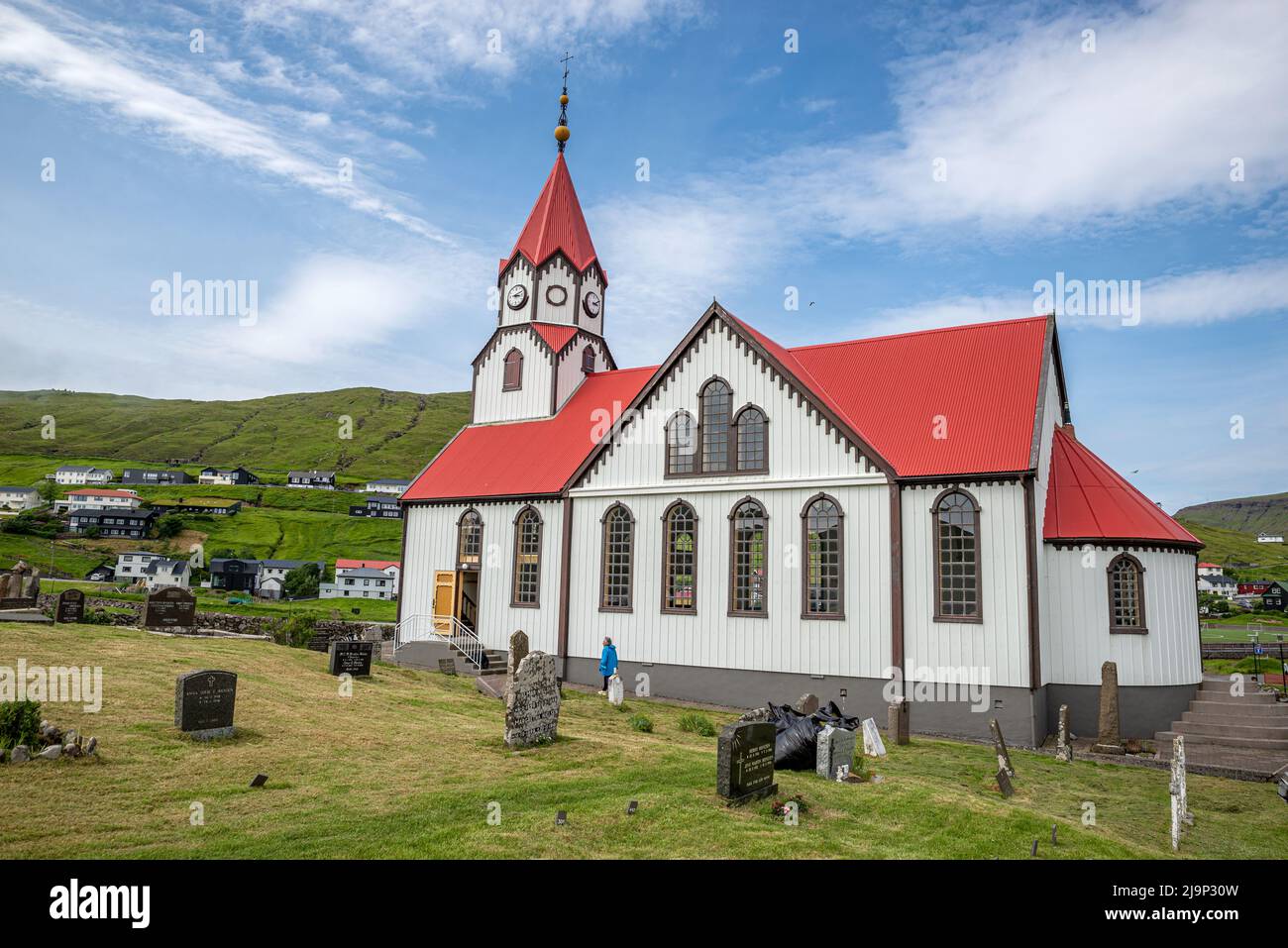Red-roofed church in Sandavagur, Vagar Islands, Faroe Archipelago Stock Photo