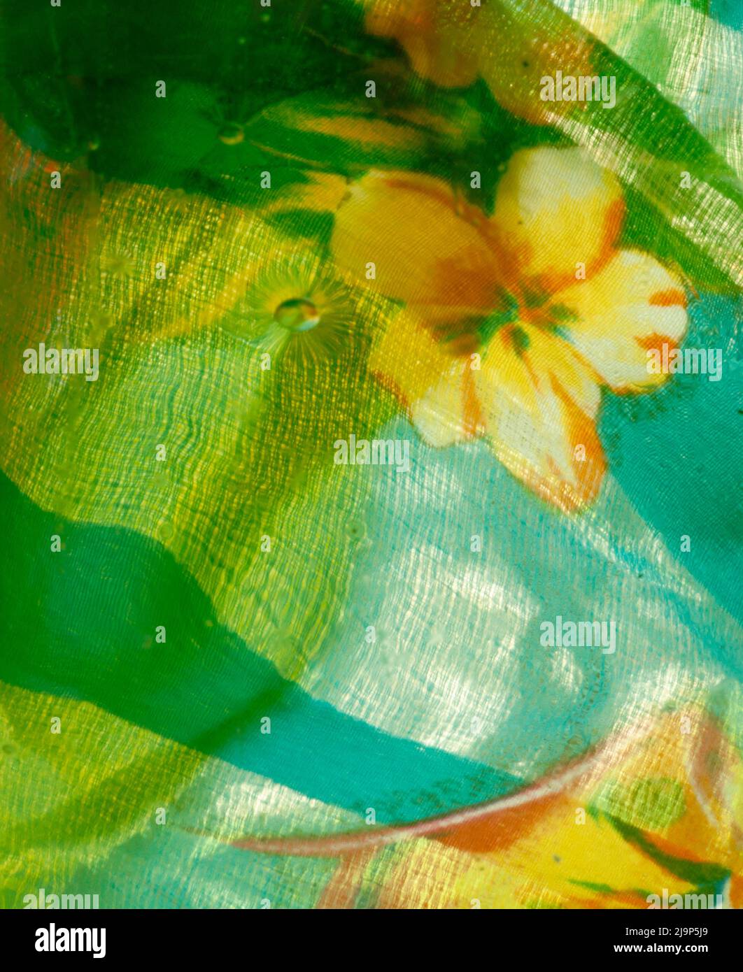 Backlit Pattern This is a closeup of backlit fabrics under glass. You can see bright ...