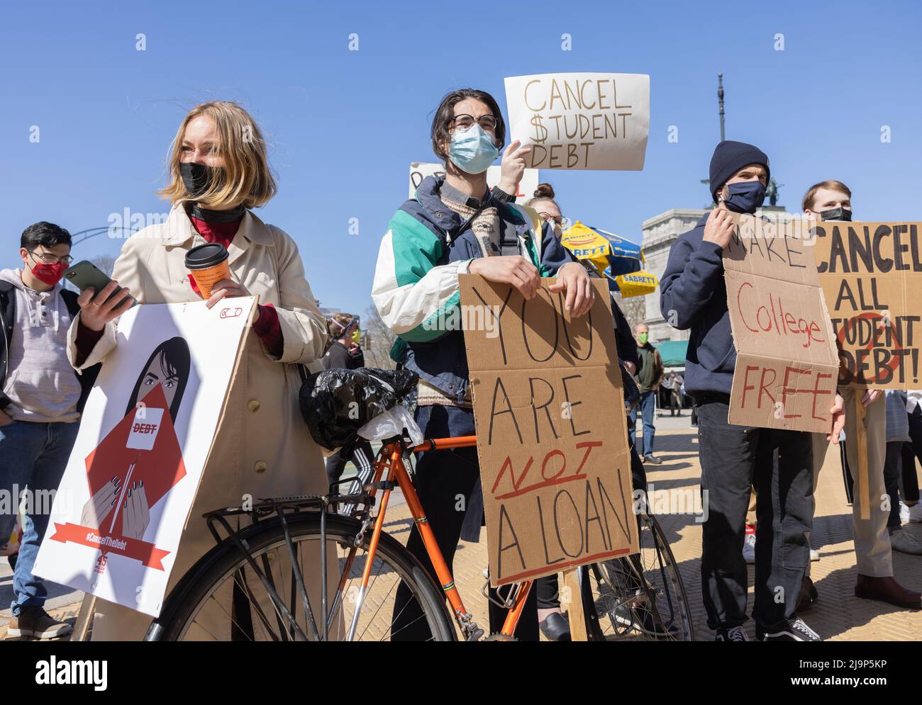 BROOKLYN, N.Y. – April 3, 2021: Demonstrators protest near Grand Army Plaza during a rally to cancel student loan debts. Stock Photo