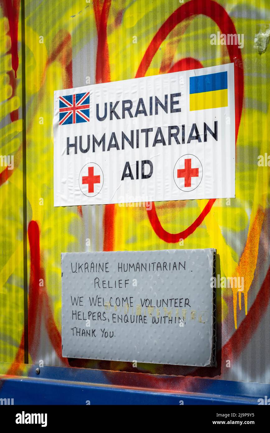 UK Ukraine Humanitarian aid sign outside a collection/ drop off point for supplies for Ukrainian refugees, Southampton, England, UK Stock Photo