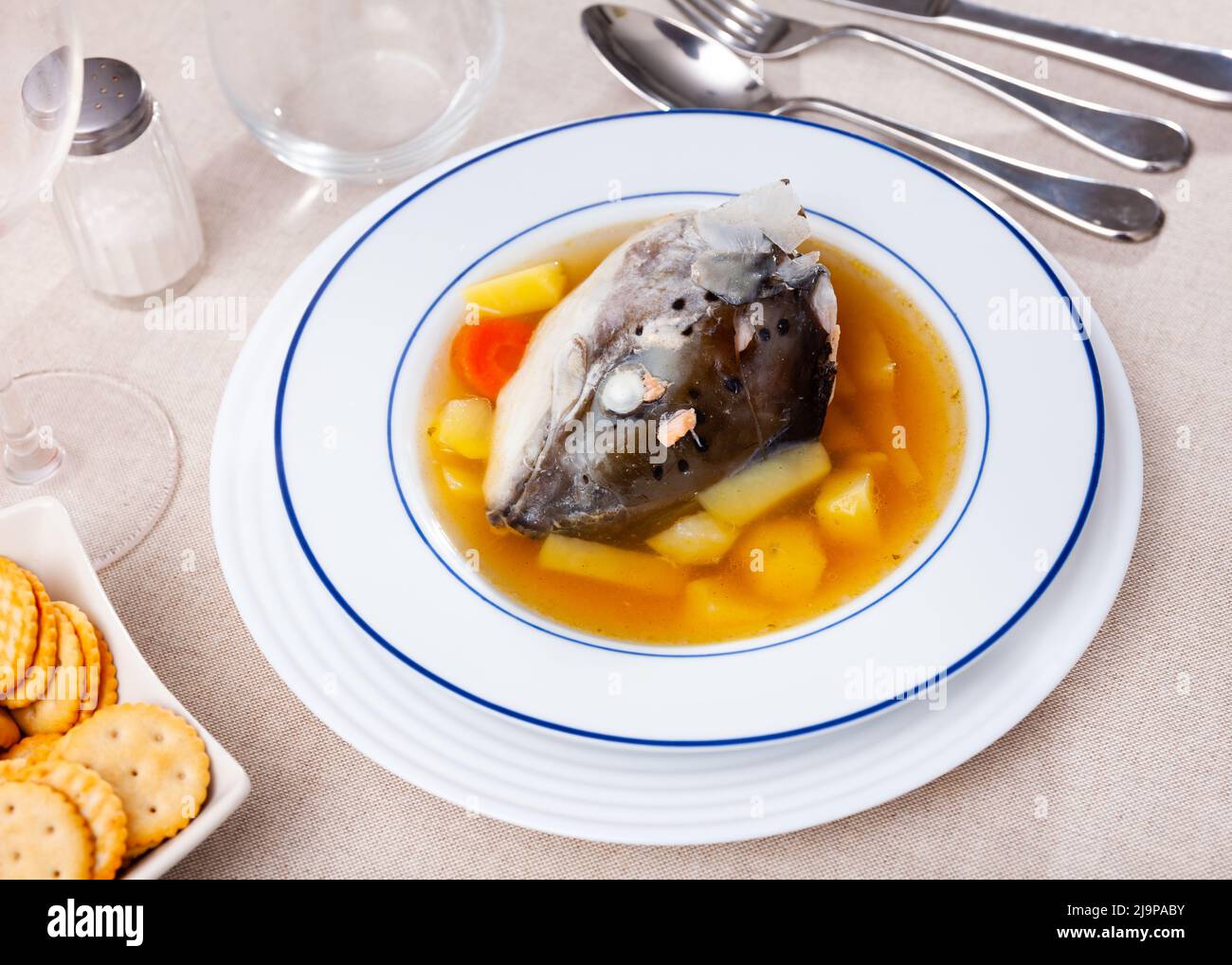 Fish soup with salmon bones and vegetables Stock Photo Alamy
