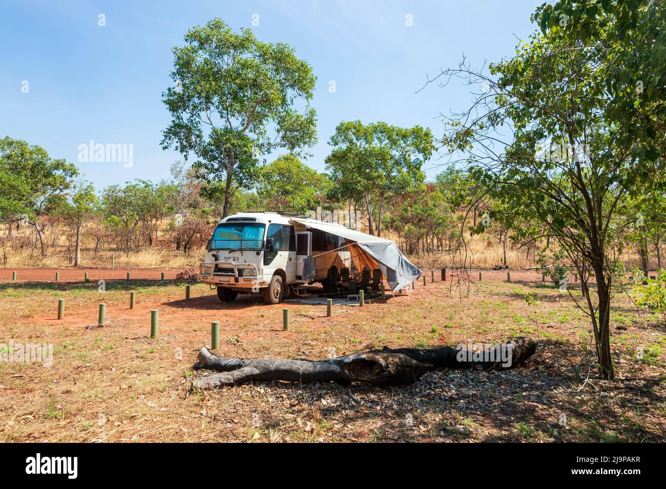 Toyota Coaster motorhome bushcamping in Keep River National Park, a popular tourist destination, Northern Territory, NT, Australia Stock Photo