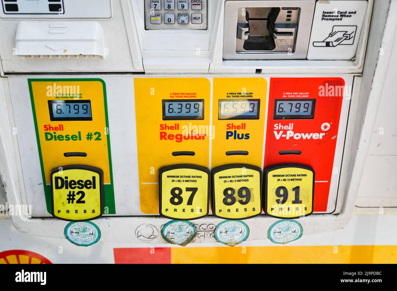 The front of a gas pump at a Shell gas station, showing prices over six dollars a gallon.  A gas hike is going into effect in California in July. Stock Photo