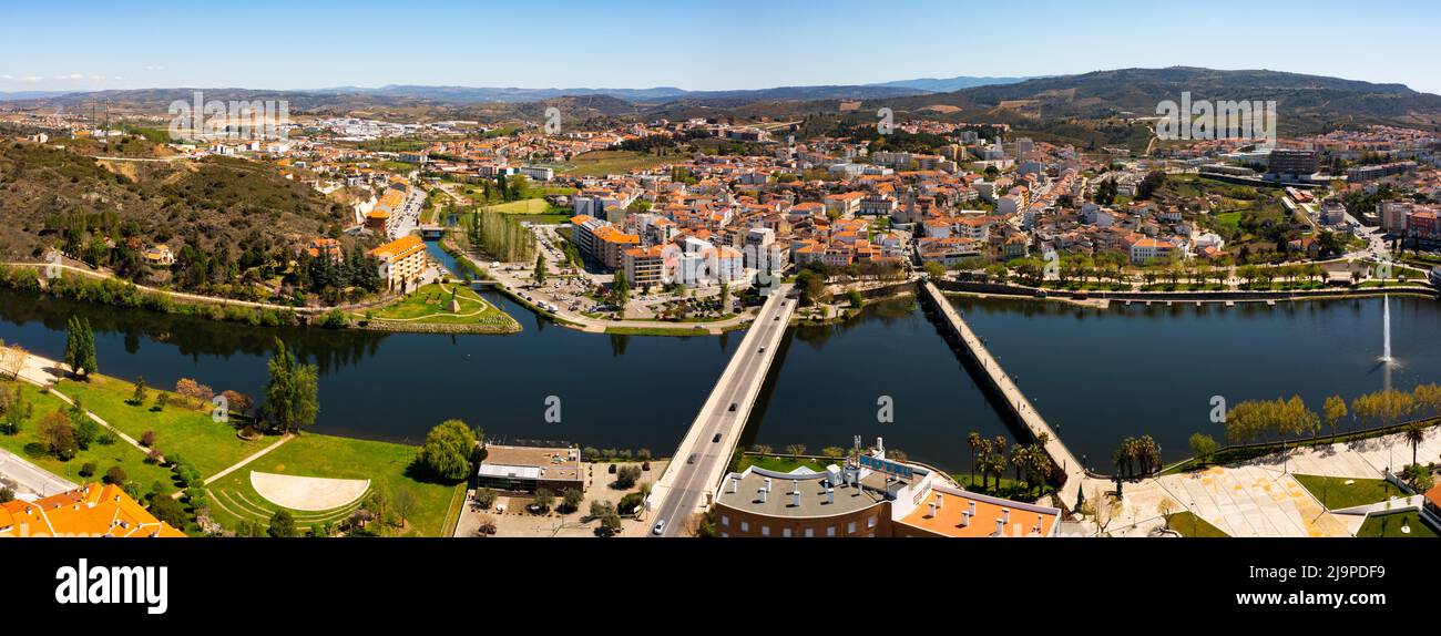 Panorama of Mirandela cityscape on banks of Tua river, Portugal Stock Photo