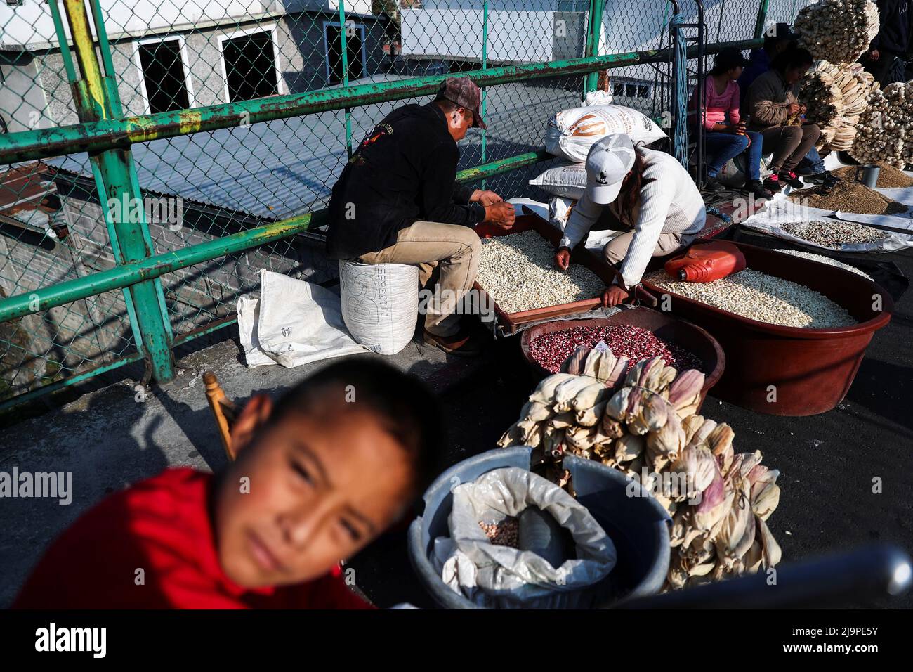 People sell corn grains at a public market in Ozumba de Alzate, State of Mexico, Mexico, May 24, 2022. REUTERS/Edgard Garrido     TPX IMAGES OF THE DAY Stock Photo