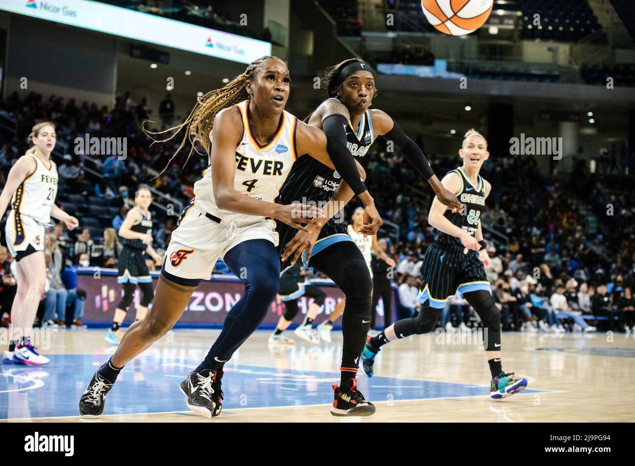 Chicago, United States. 24th May, 2022. Kahleah Copper (2 Chicago Sky) and Queen Egbo (4 Indiana Fever) chase the ball during the game between the Chicago Sky and Indiana Fever on Tuesday May 24, 2022 at Wintrust Arena, Chicago, USA. (NO COMMERCIAL USAGE) Shaina Benhiyoun/SPP Credit: SPP Sport Press Photo. /Alamy Live News Stock Photo