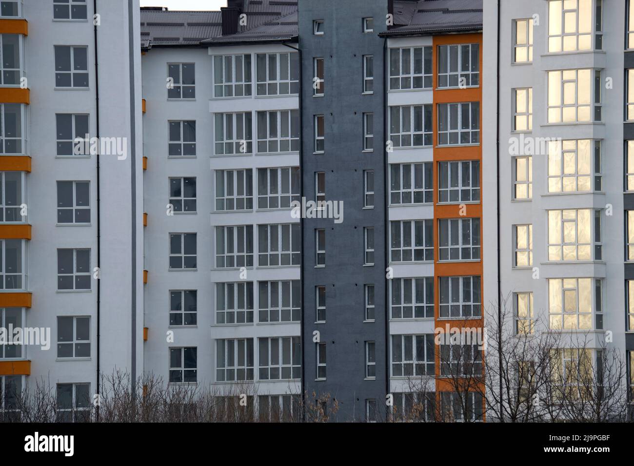 Architectural details of modern high apartment building facade with ...