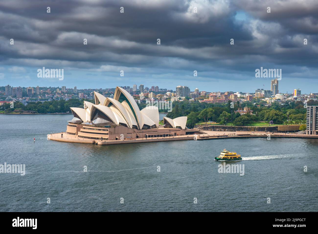 Sydney, Australia - Mar 23, 2022: Aerial view of Sydney Opera House with stormy cloud Stock Photo