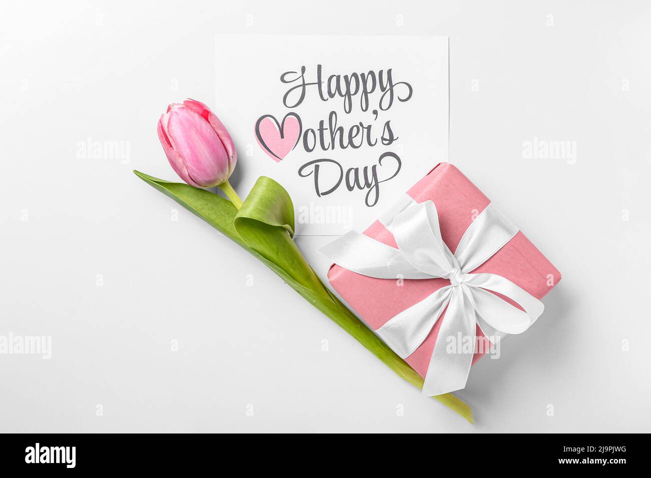 Card with text HAPPY MOTHER'S DAY, pink tulip and gift box on white ...
