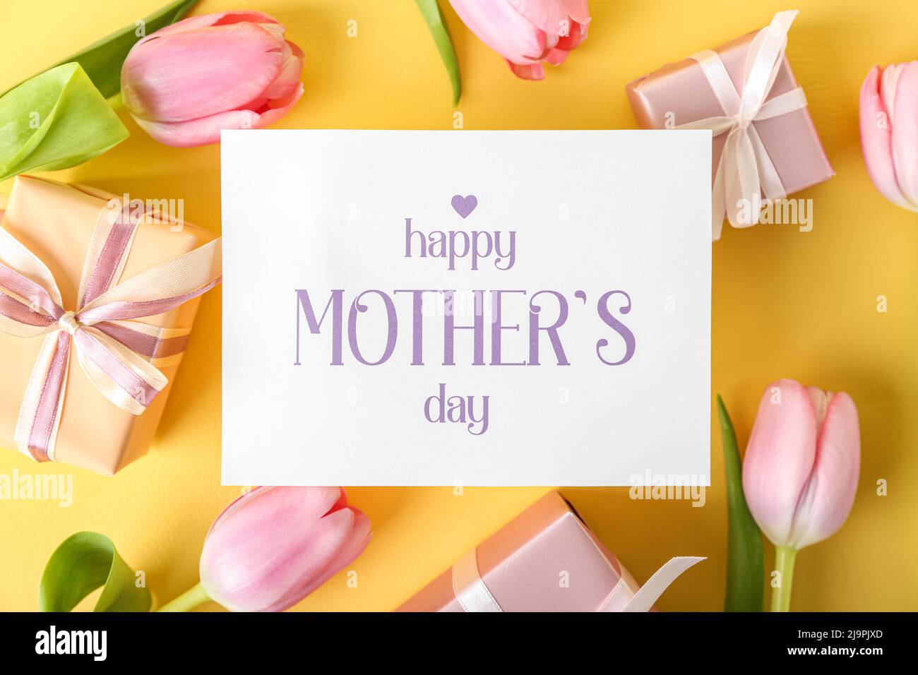 Card with text HAPPY MOTHER'S DAY, gift boxes and tulips on yellow ...
