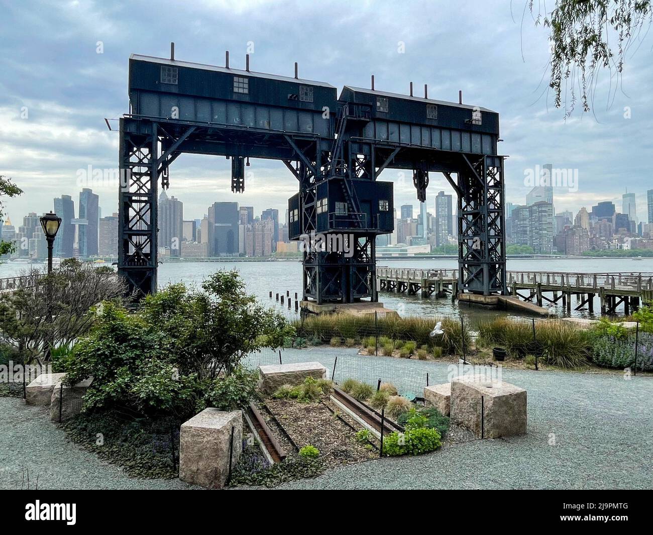 Queens, NY - USA - May 20, 2022 View of the 12-acre Gantry Plaza State Park, a former dockyard on the East River in Hunters Point section of Long Isla Stock Photo