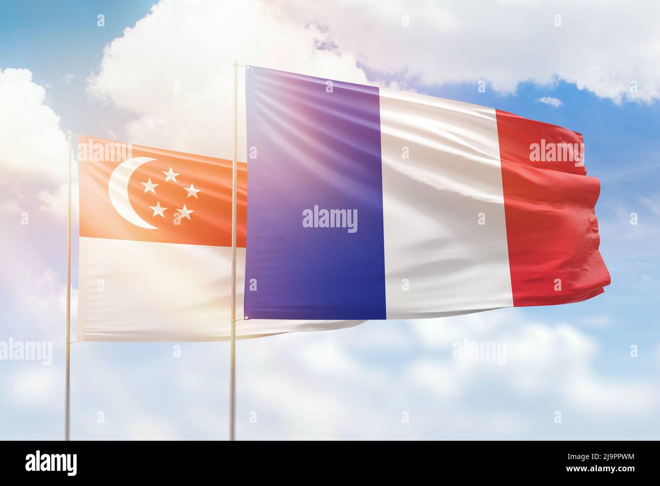 Sunny blue sky and flags of france and singapore Stock Photo Alamy