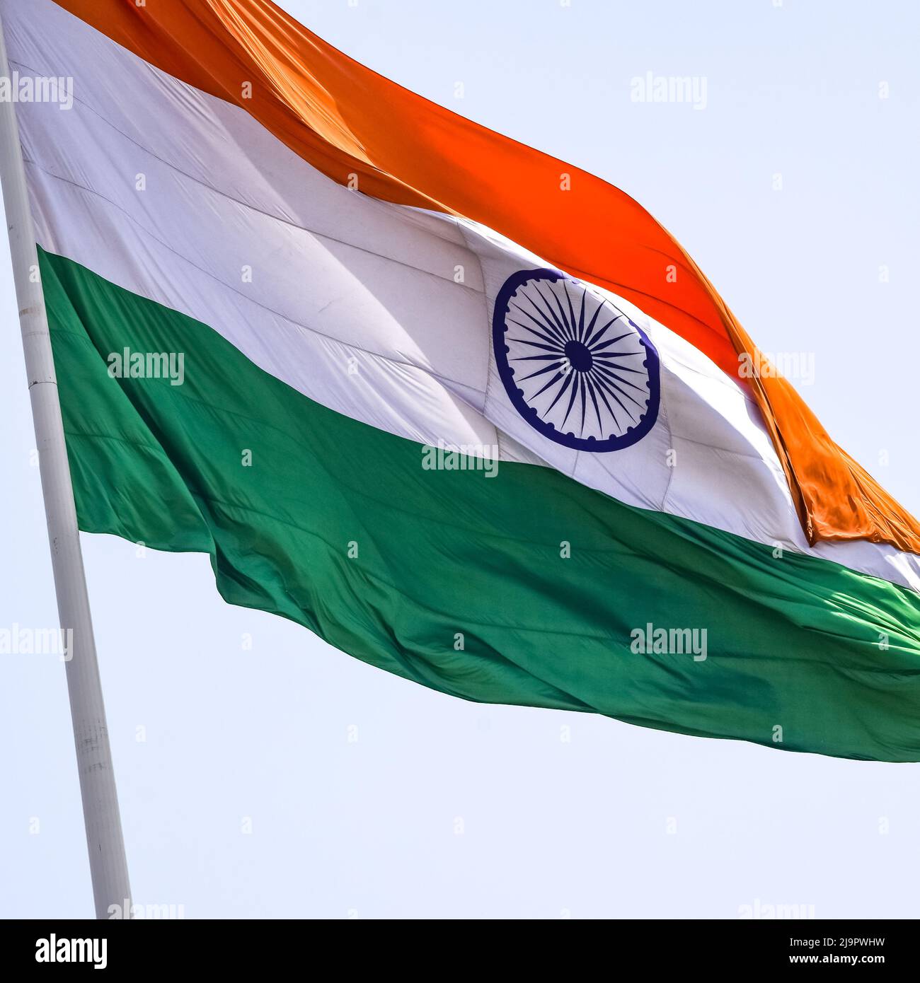 India flag flying high at Connaught Place with pride in blue sky, India ...