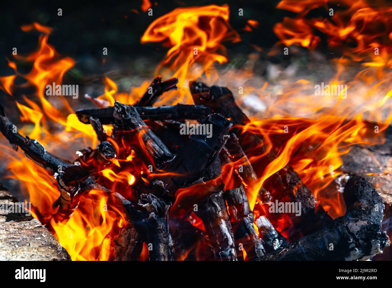 Charcoal for barbecue with flame background Stock Photo Alamy