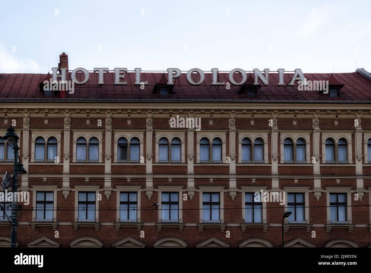 KRAKOW, POLAND - MAY 16, 2022:  Sign above Polonia Hotel in the Old Town Stock Photo