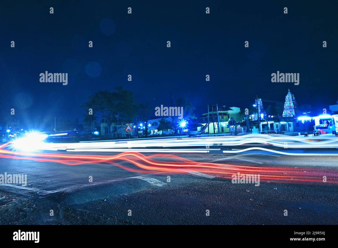 Bangalore, India - May 15, 2022: Beautiful wavy light trail passing near anjaneya temple kanakapura road Stock Photo