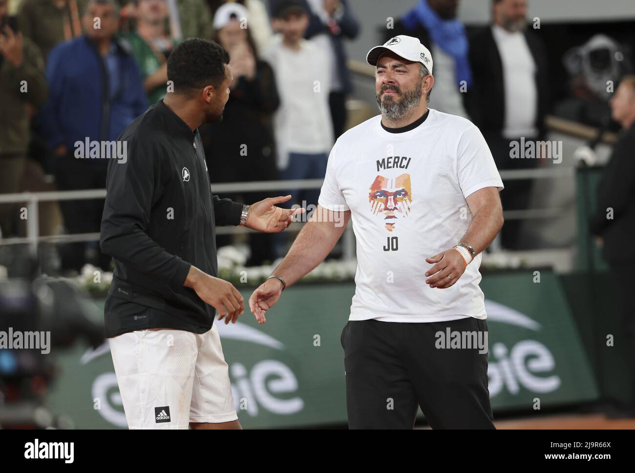 Jo-Wilfried Tsonga of France, his coach Thierry Ascione during a ceremony  celebrating his career after his last tennis match against Casper Ruud of  Norway on day 3 of the French Open 2022,