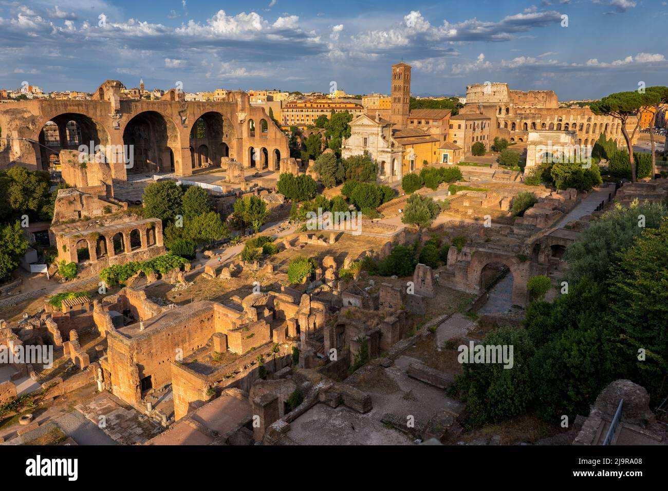 Sunset above the ancient ruins of the Roman Forum in city of Rome, Italy. Stock Photo
