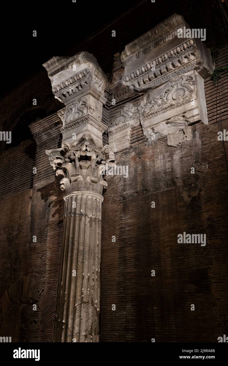 The Pantheon temple architectural details at night in Rome, Italy. Corinthian column and entablature with relief. Stock Photo