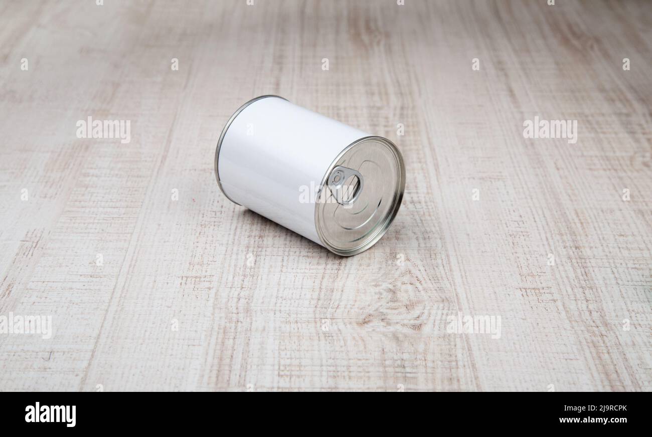 tin can on white wood background. Stock Photo