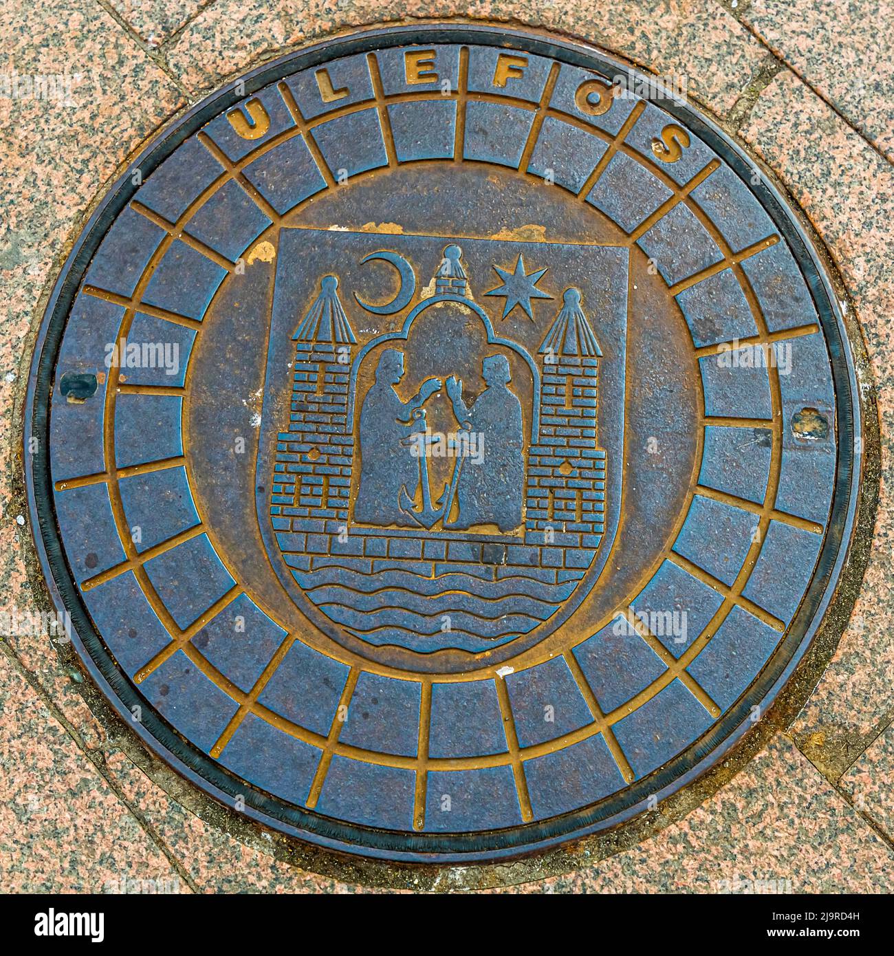 Manhole cover in Aarhus, Denmark Stock Photo