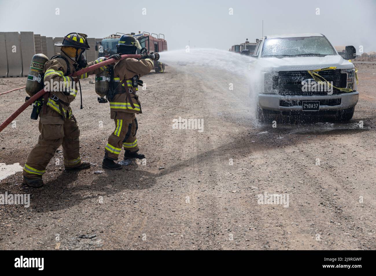 U.S. Air Force fire protection specialists with the 776th Expeditionary ...