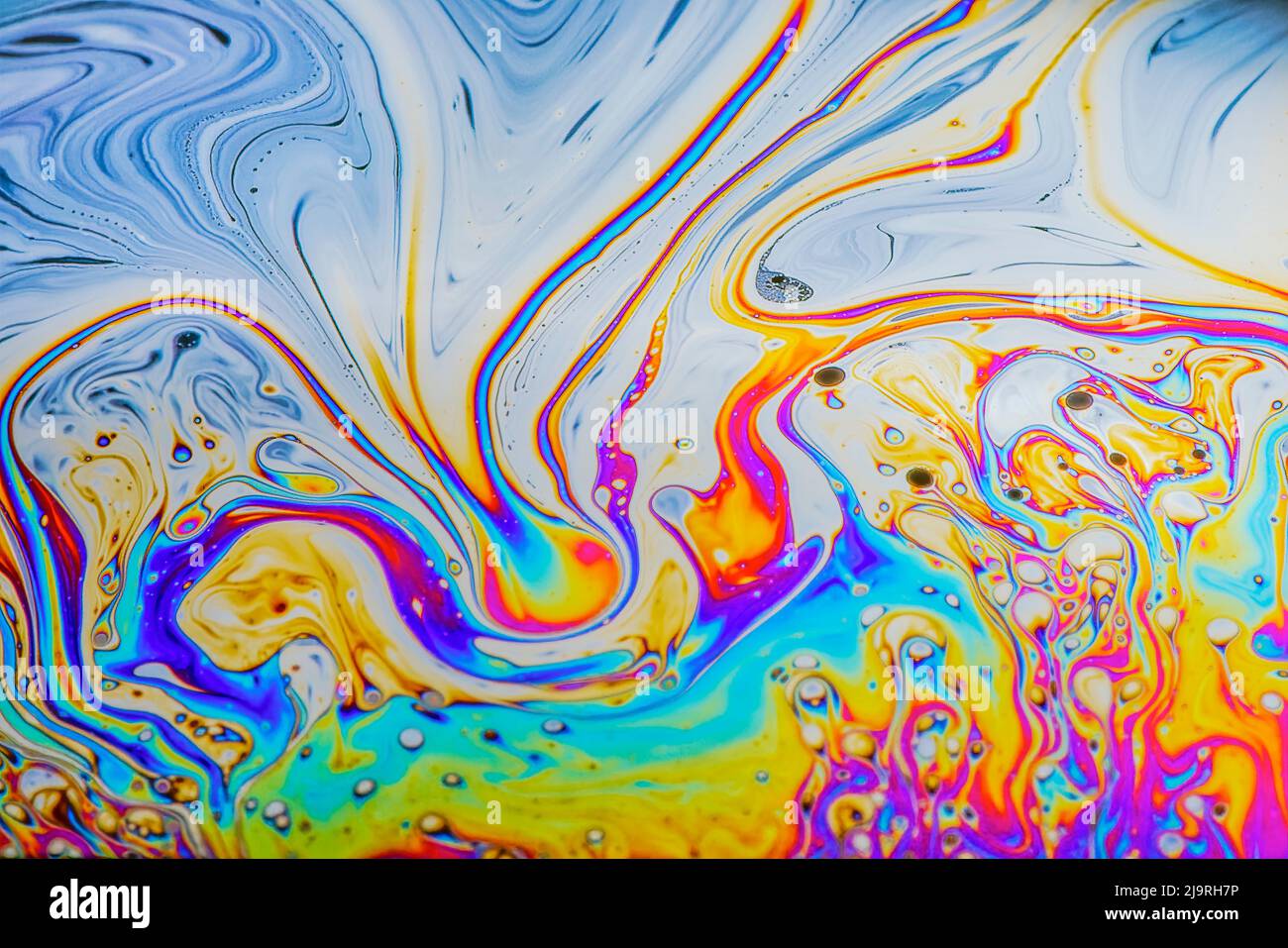 Abstract pattern of refracted light in soap bubble. Stock Photo