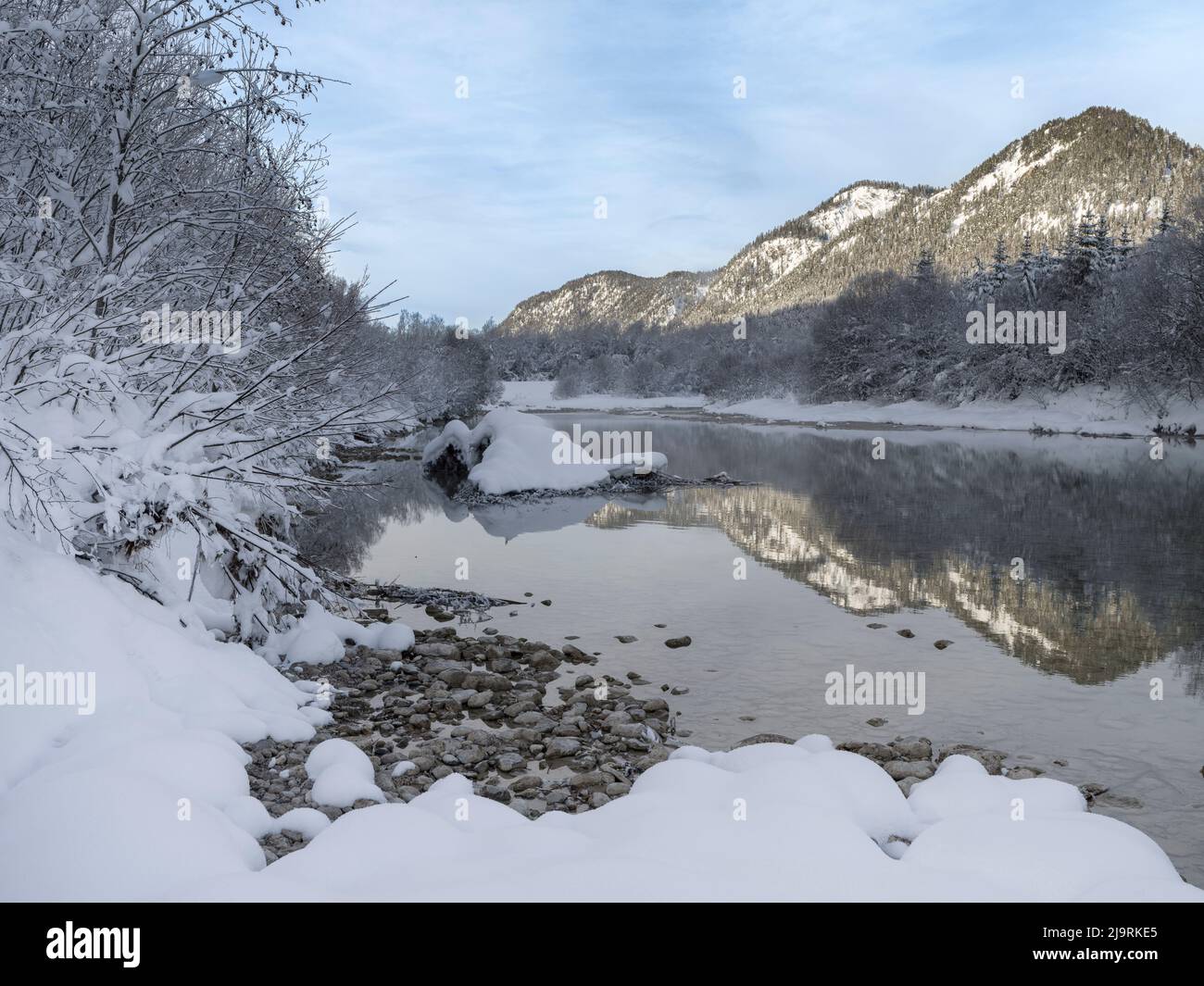 River Isar near Sylvenstein Reservoir close to village in the Karwendel mountain range during winter. Germany, Upper Bavaria Stock Photo