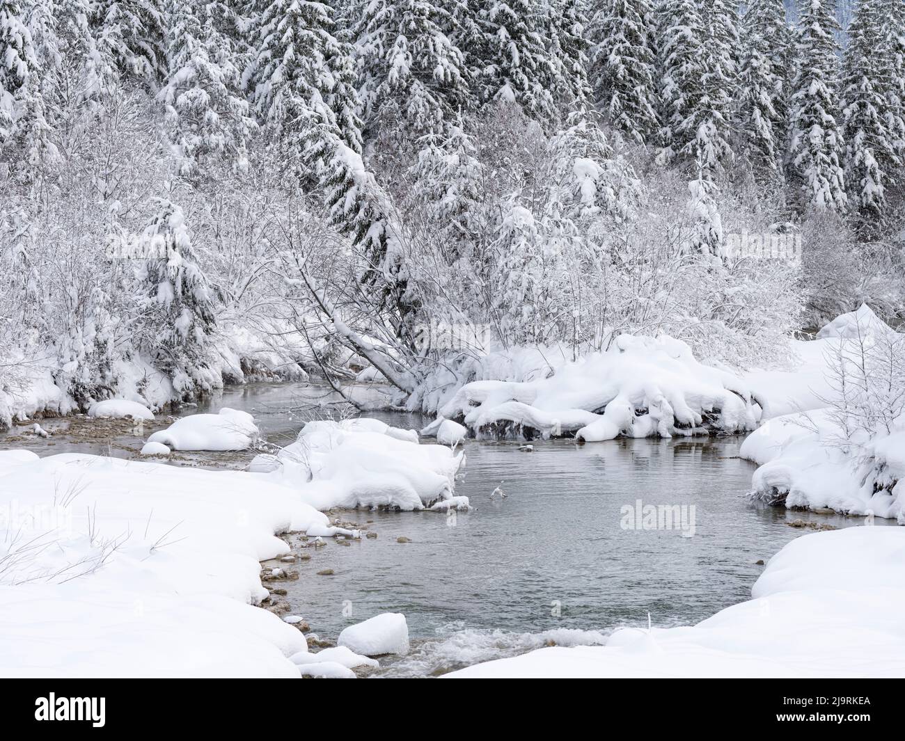 River Isar near Sylvenstein Reservoir close to village in the Karwendel mountain range during winter. Germany, Upper Bavaria Stock Photo