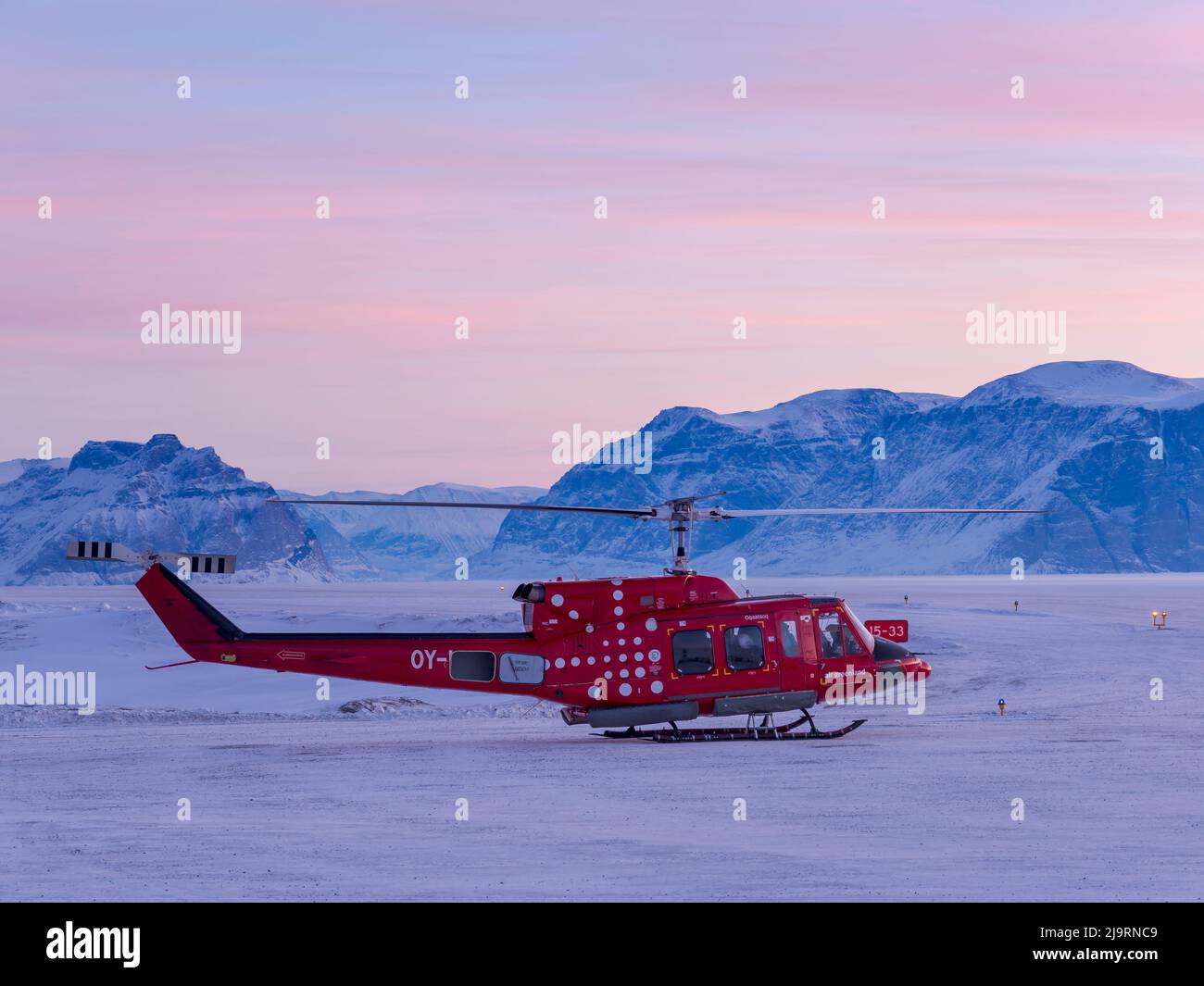 Air Greenland Bell 212. Qaarsut airport near Uummannaq during winter in