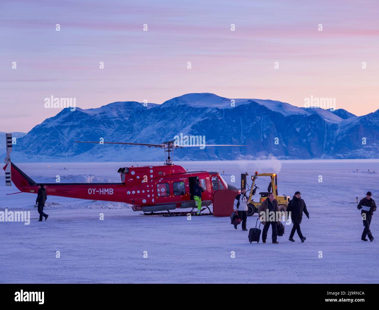 Air Greenland Bell 212. Qaarsut airport near Uummannaq during winter in