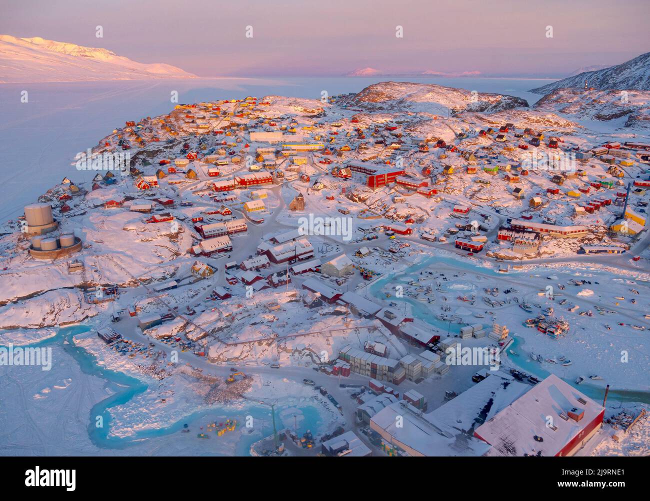 Town Uummannaq during winter in northern West Greenland beyond the Arctic Circle. Greenland, Danish territory Stock Photo