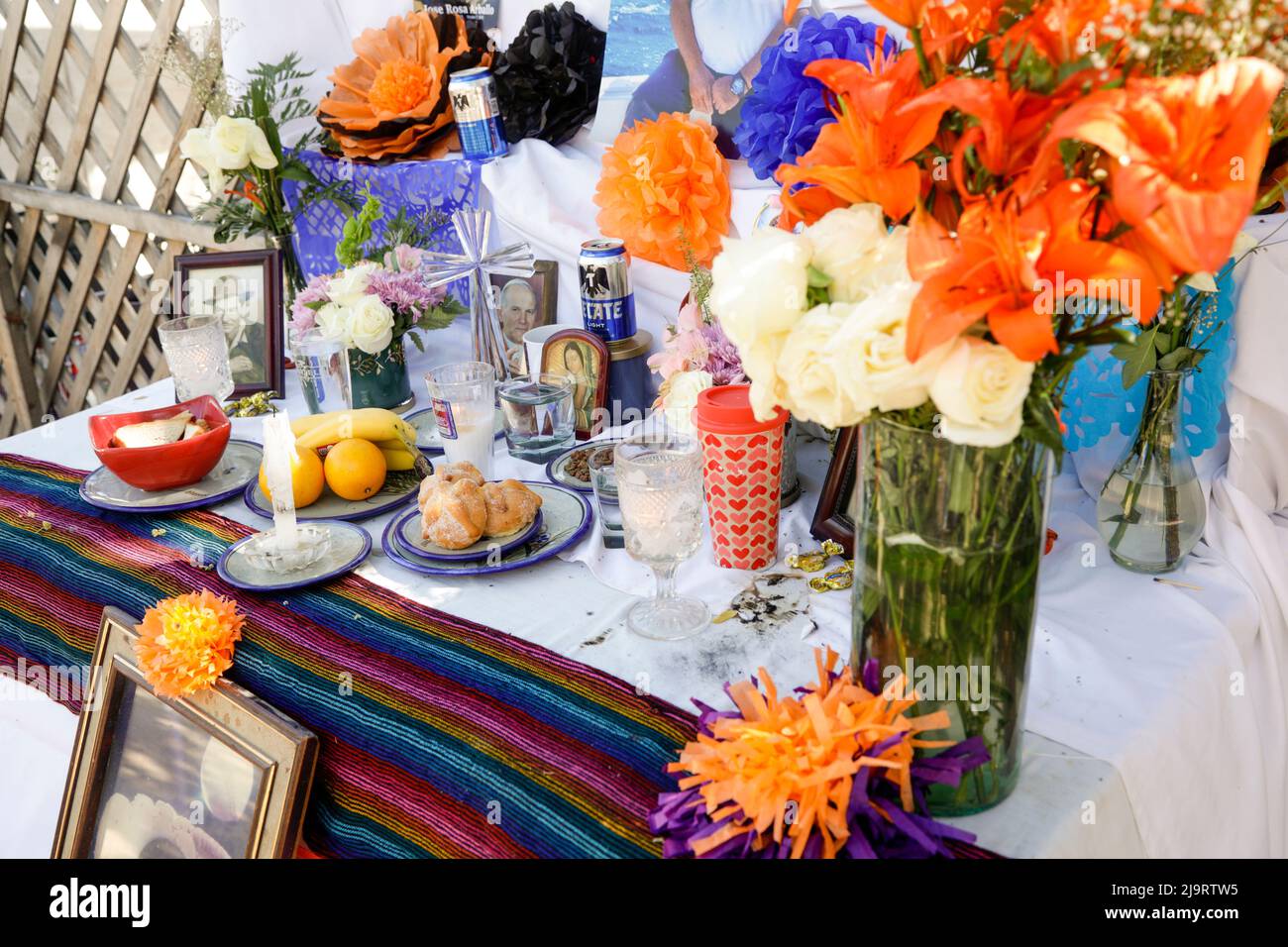 Cabo San Lucas, Mexico. Flowers, photos, and other offerings on a