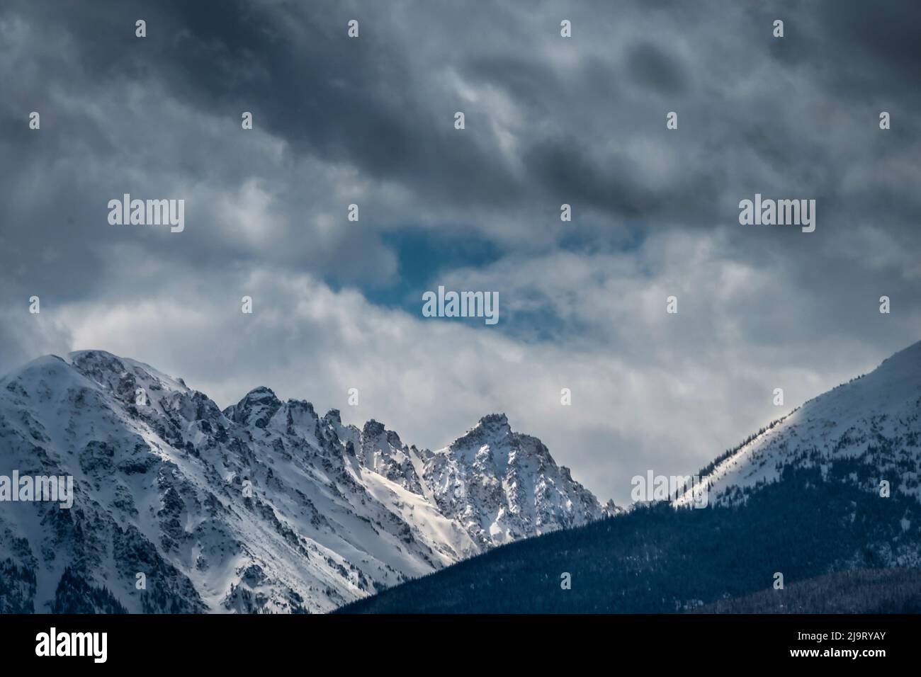 USA, Colorado, Steamboat Springs. Storm clouds form over mountains. Stock Photo