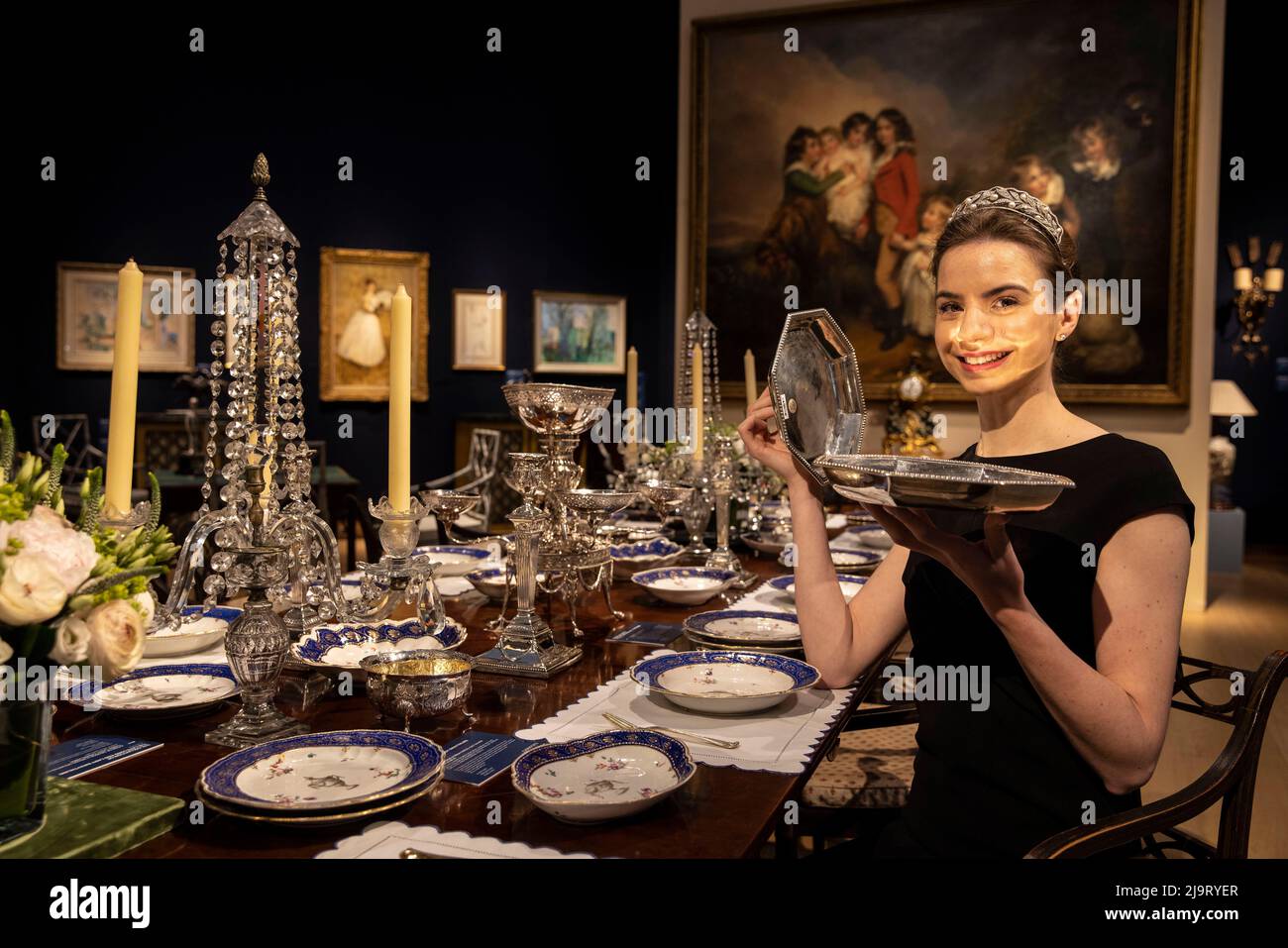 Christies Collection of The Late Lord And Lday Swaythling Picture shows Michaela Suhl, jewelry specialist amongst some of the antique furniture. Stock Photo