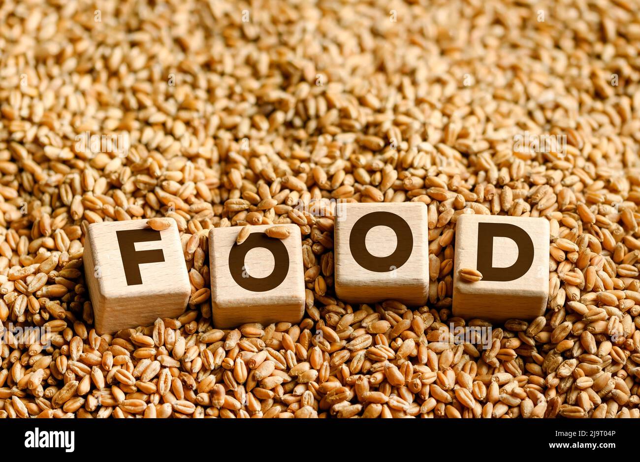 Food word on wooden blocks and wheat grain background Stock Photo Alamy