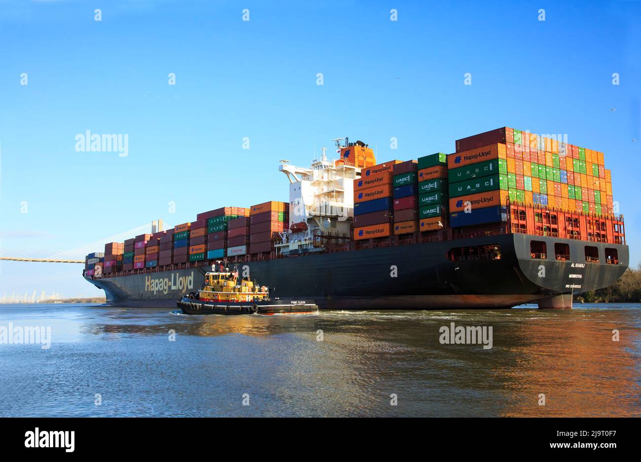 USA, Georgia, Savannah. Container ship entering Savannah Harbor ...