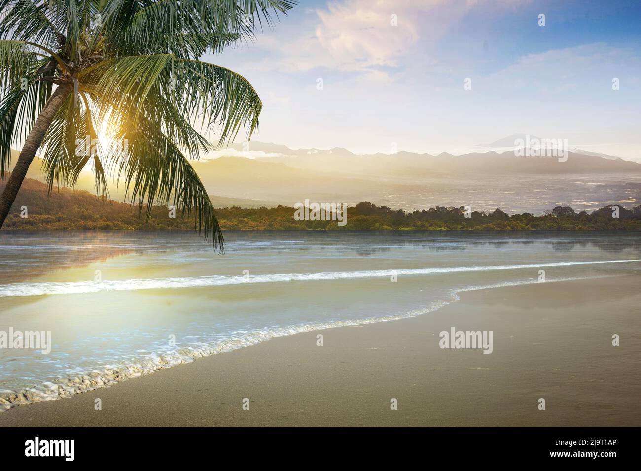 Sandy beach with the blue ocean and sunlight sky background Stock Photo ...