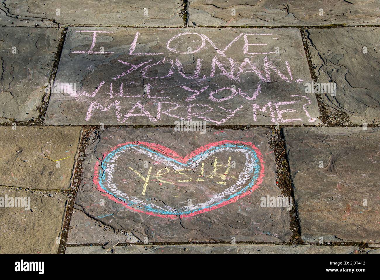USA, New York City, Manhattan, Upper East Side. John Finley Walk along East River, sidewalk graffiti, 'Will you marry me?' proposal Stock Photo