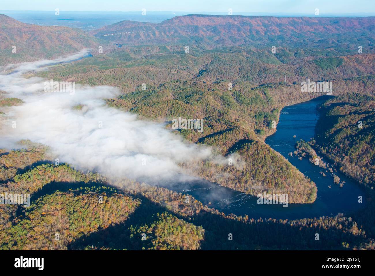 USA, Tennessee. Morning fog Hiwassee River, Blue Ridge fall color Stock Photo