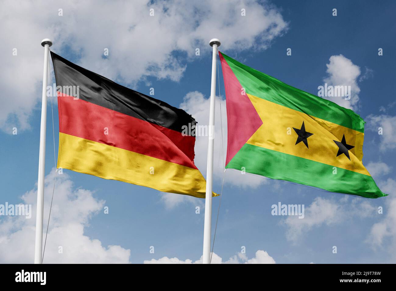 Germany and Sao Tome and Principe two flags on flagpoles and blue cloudy sky background Stock Photo
