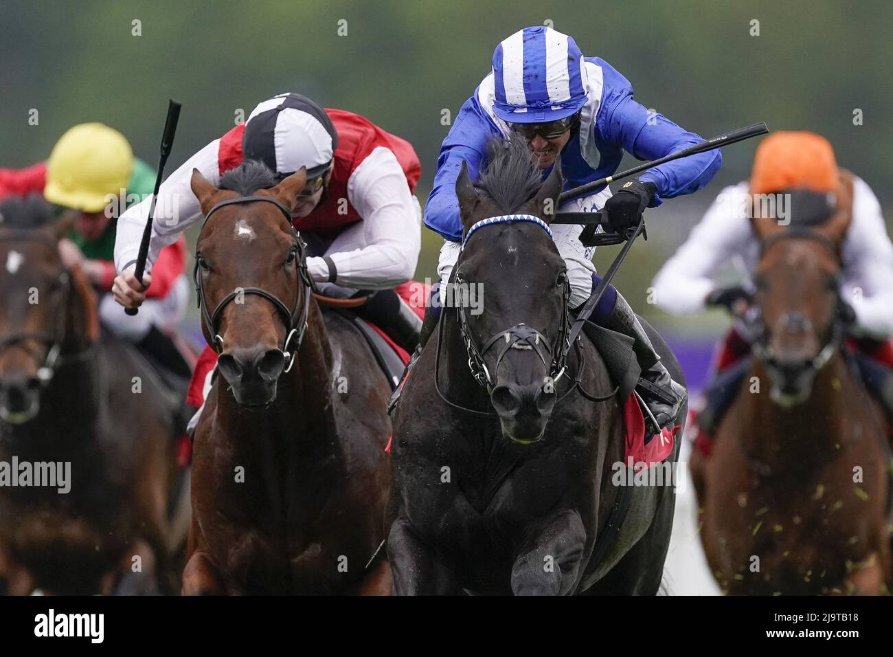 File photo dated 20-05-2021 of Jim Crowley riding Mostahdaf (right, blue and white). Mostahdaf can continue his progression with victory in the Coral Brigadier Gerard Stakes at Sandown. Issue date: Wednesday May 25, 2022. Stock Photo