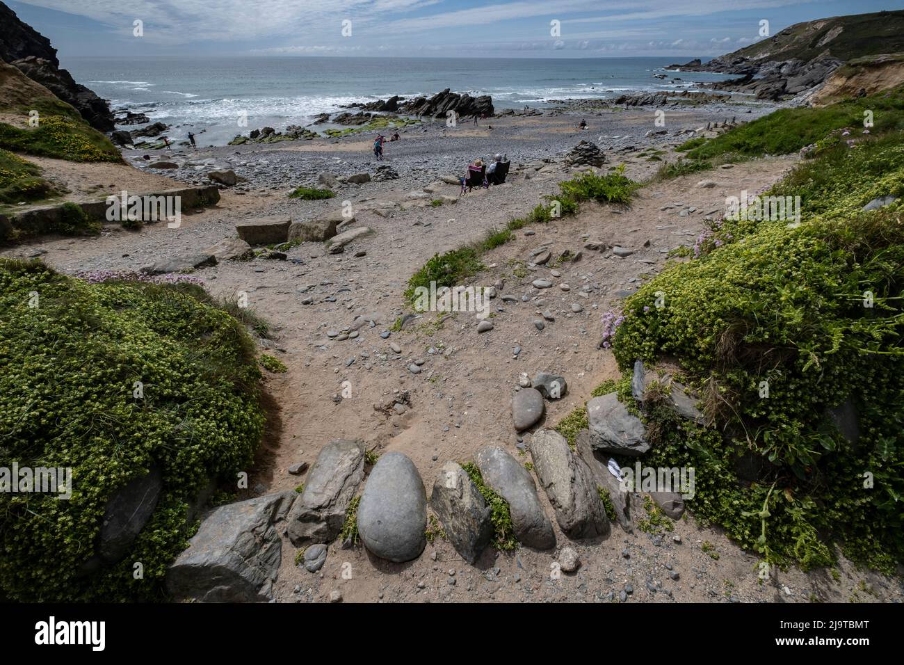 The rocky beach of Dollar Cove in Cornwall, England. Stock Photo