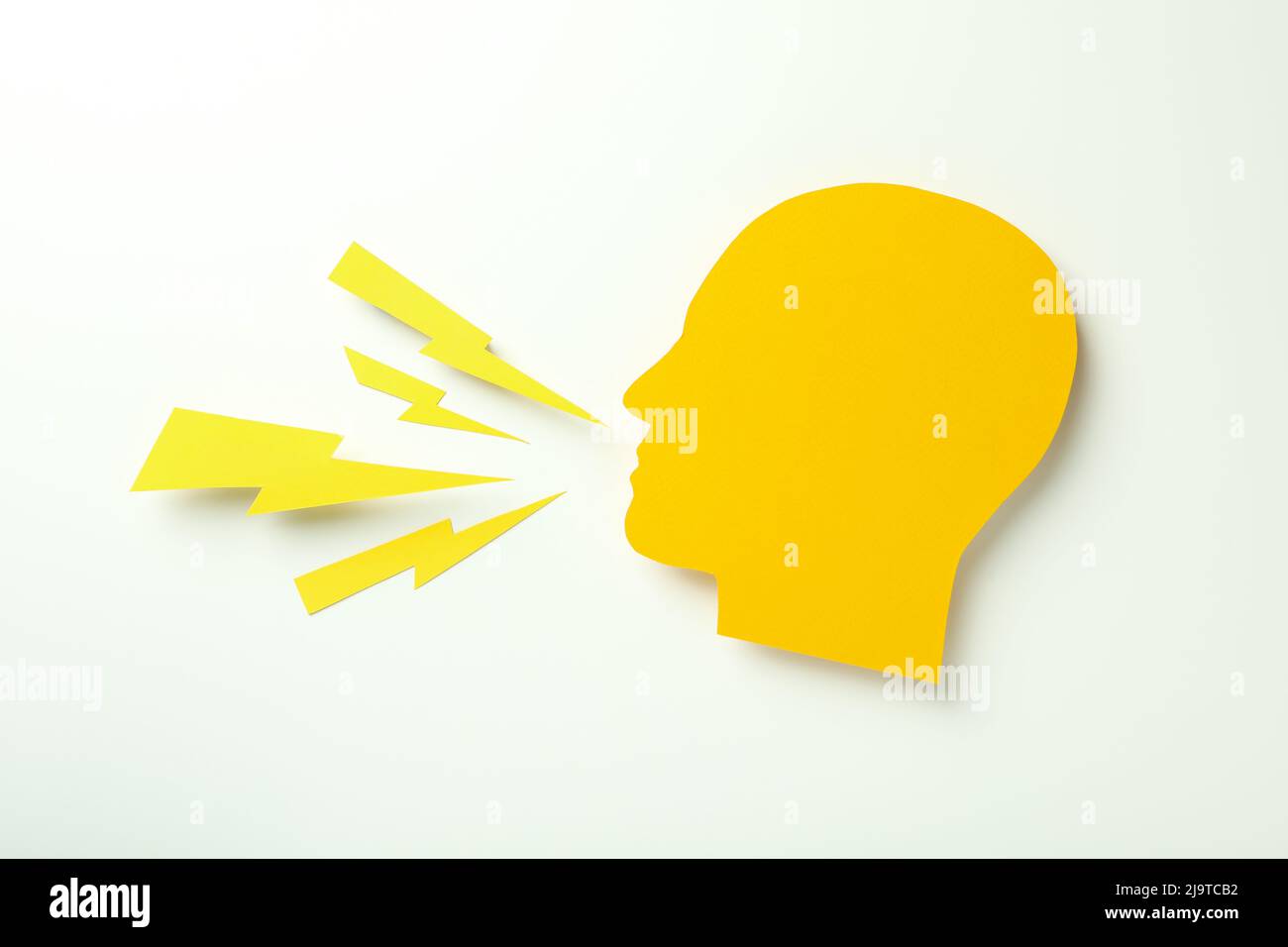 Paper head and lightnings on white background Stock Photo
