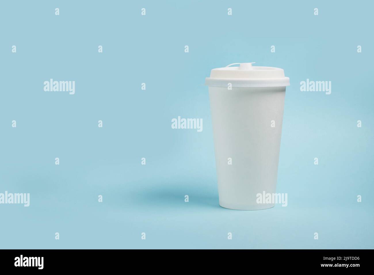 White paper coffee cup with plastic lid Stock Photo
